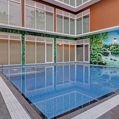 Отель Treebo Golden Terminal, Kochi Airport Экстерьер фото